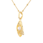 Sea Treasure Gold Pendant by LAVANA Shell inspired pendant with freshwater pearl