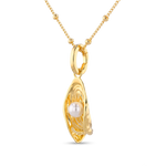 Sea Treasure Gold Pendant by LAVANA Shell inspired pendant with freshwater pearl