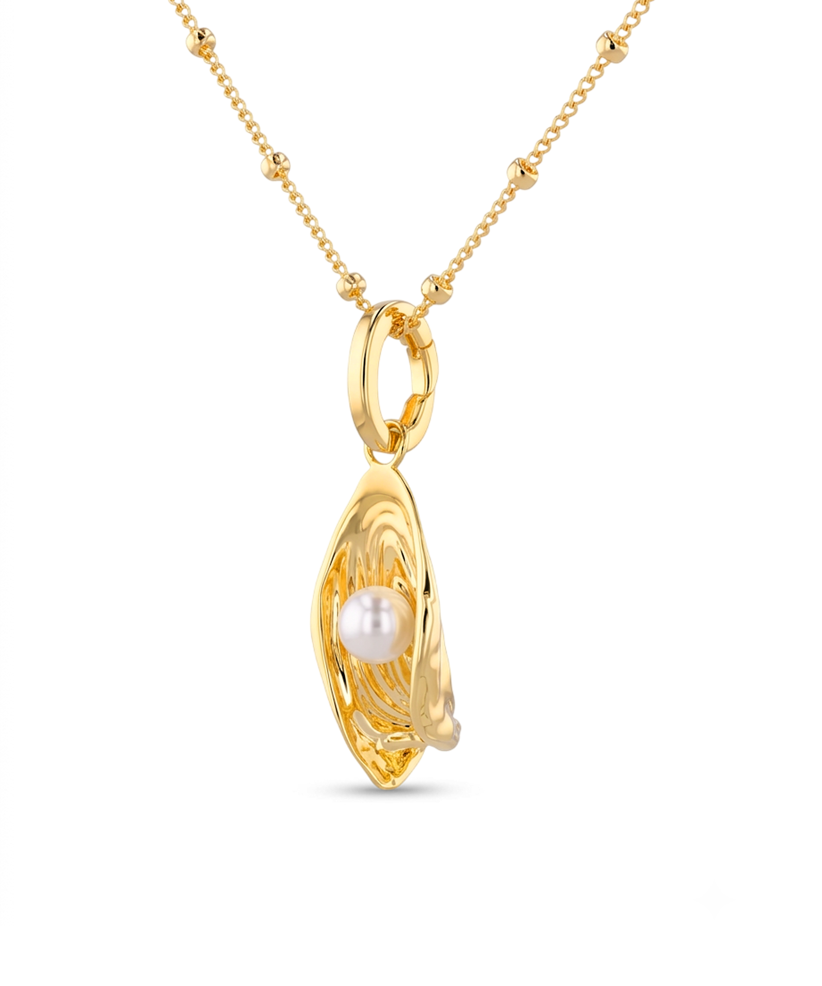 Sea Treasure Gold Pendant by LAVANA Shell inspired pendant with freshwater pearl