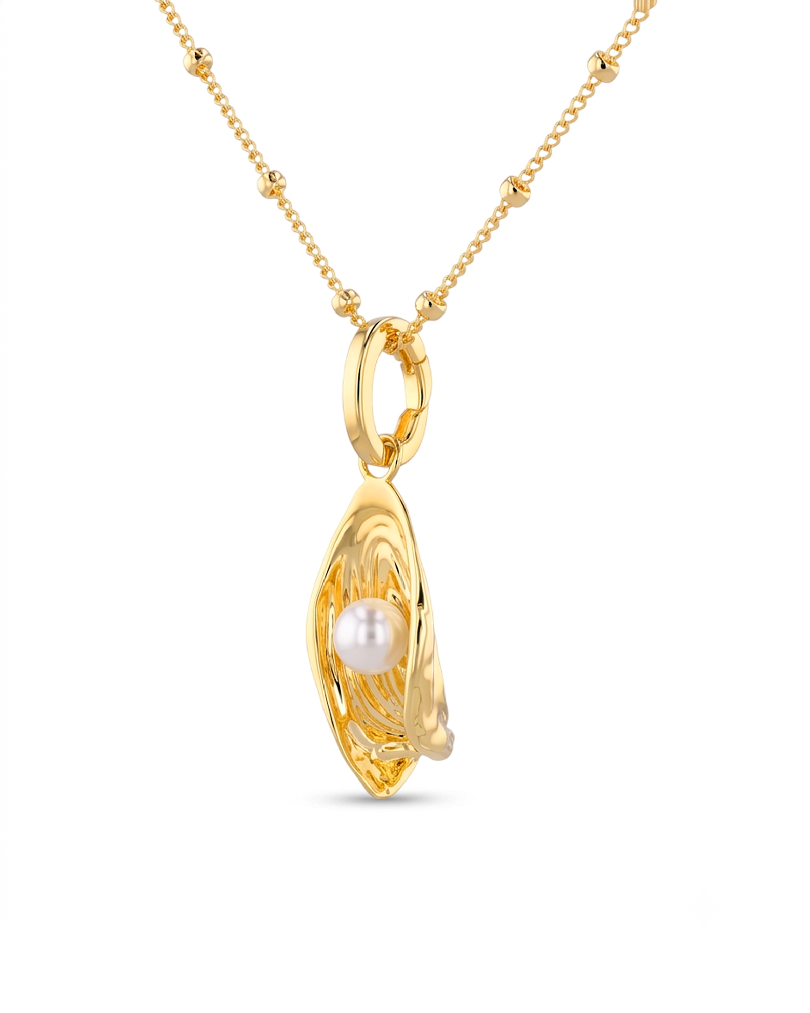 Sea Treasure Gold Pendant by LAVANA Shell inspired pendant with freshwater pearl