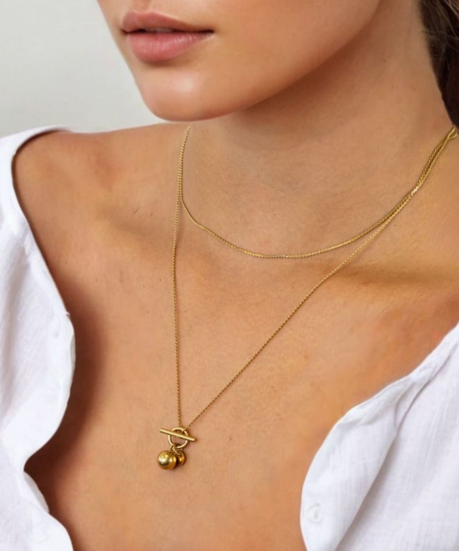 Serpentine Gold Lariat Chain Necklace by LAVANA on model fine serpentine chain with polished lariat drop