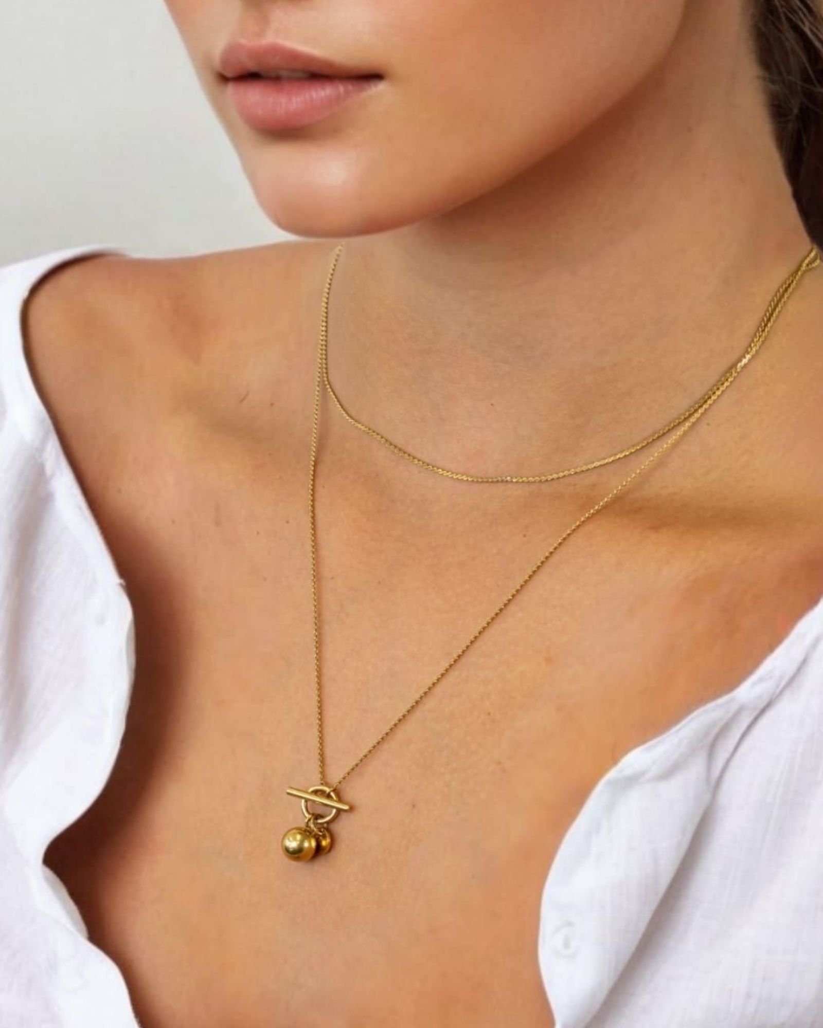 Serpentine Gold Lariat Chain Necklace by LAVANA on model fine serpentine chain with polished lariat drop