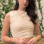 Sicily Gold Pearl Bracelet by Lavana, on model; modern chunky link chain with freshwater pearls and coin medallion