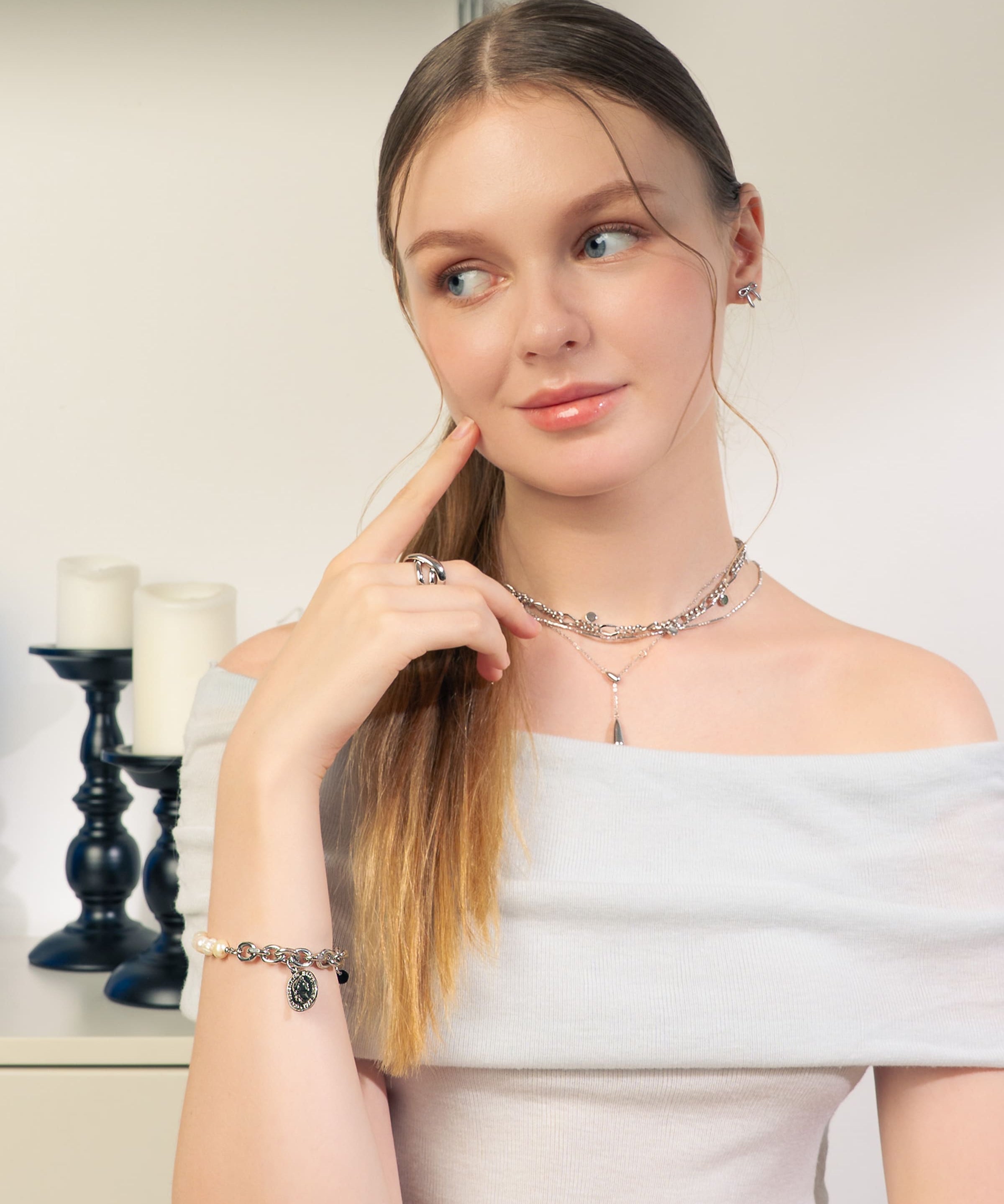 Sicily Silver Pearl Bracelet by Lavana, on model classic chunky link chain with freshwater pearls and coin medallion charm