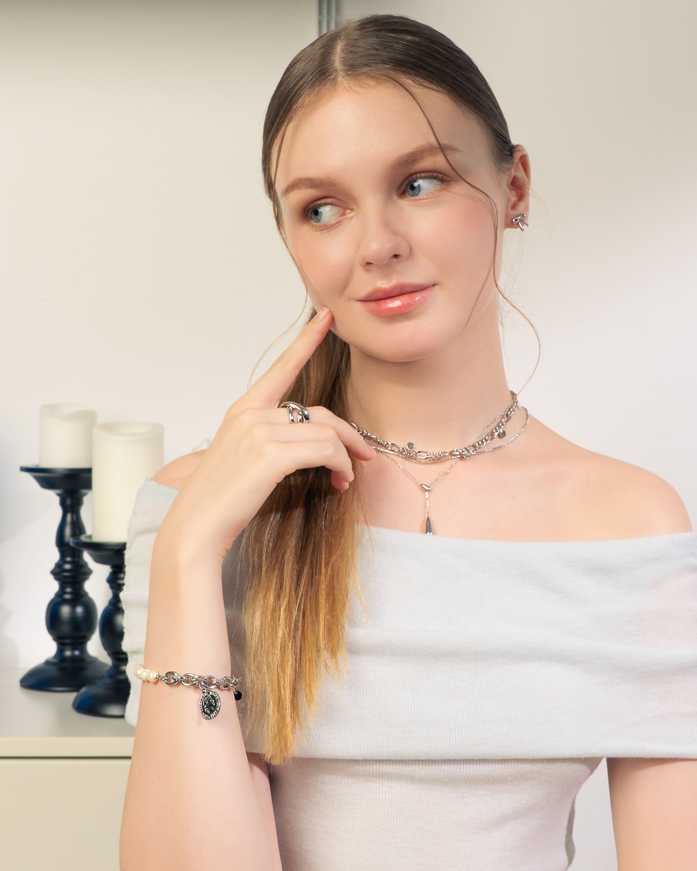 Sicily Silver Pearl Bracelet by Lavana, on model classic chunky link chain with freshwater pearls and coin medallion charm