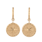 Starburst Charm Gold Huggie Earrings by LAVANA, Textured disc with raised star motif