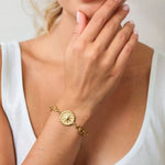 Starburst Coin Gold Bracelet by LAVANA coin pendant with engraved starburst compass