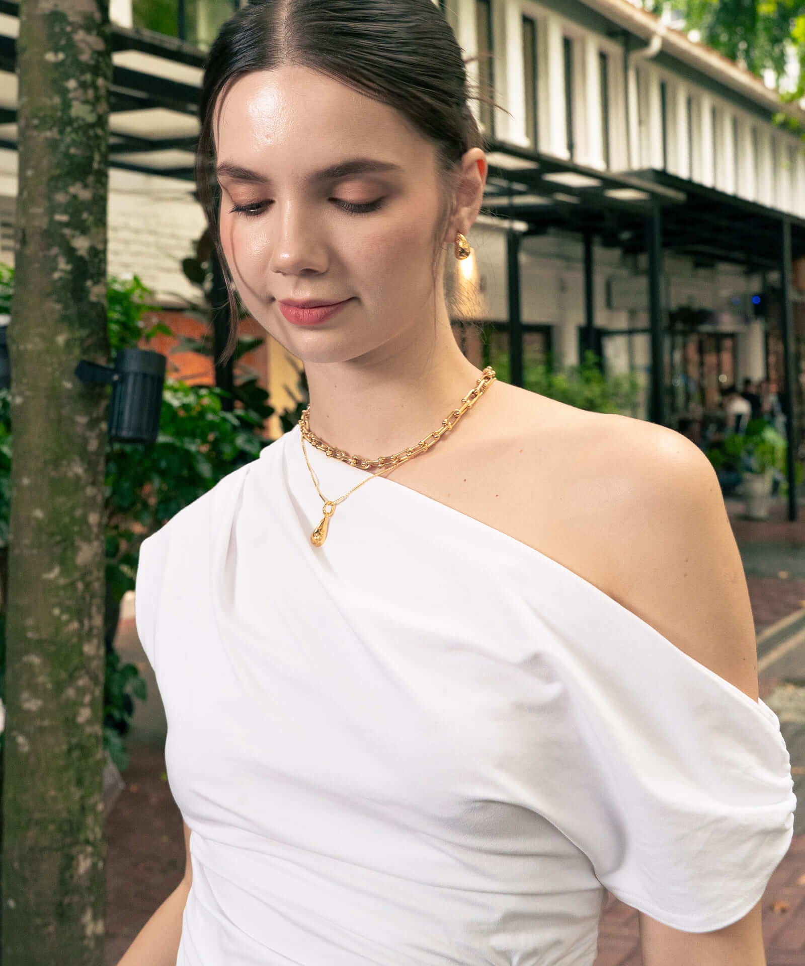 Stardust Raindrop Gold Pendant by Lavana, on model; with classic crescent moons and lab grown diamonds