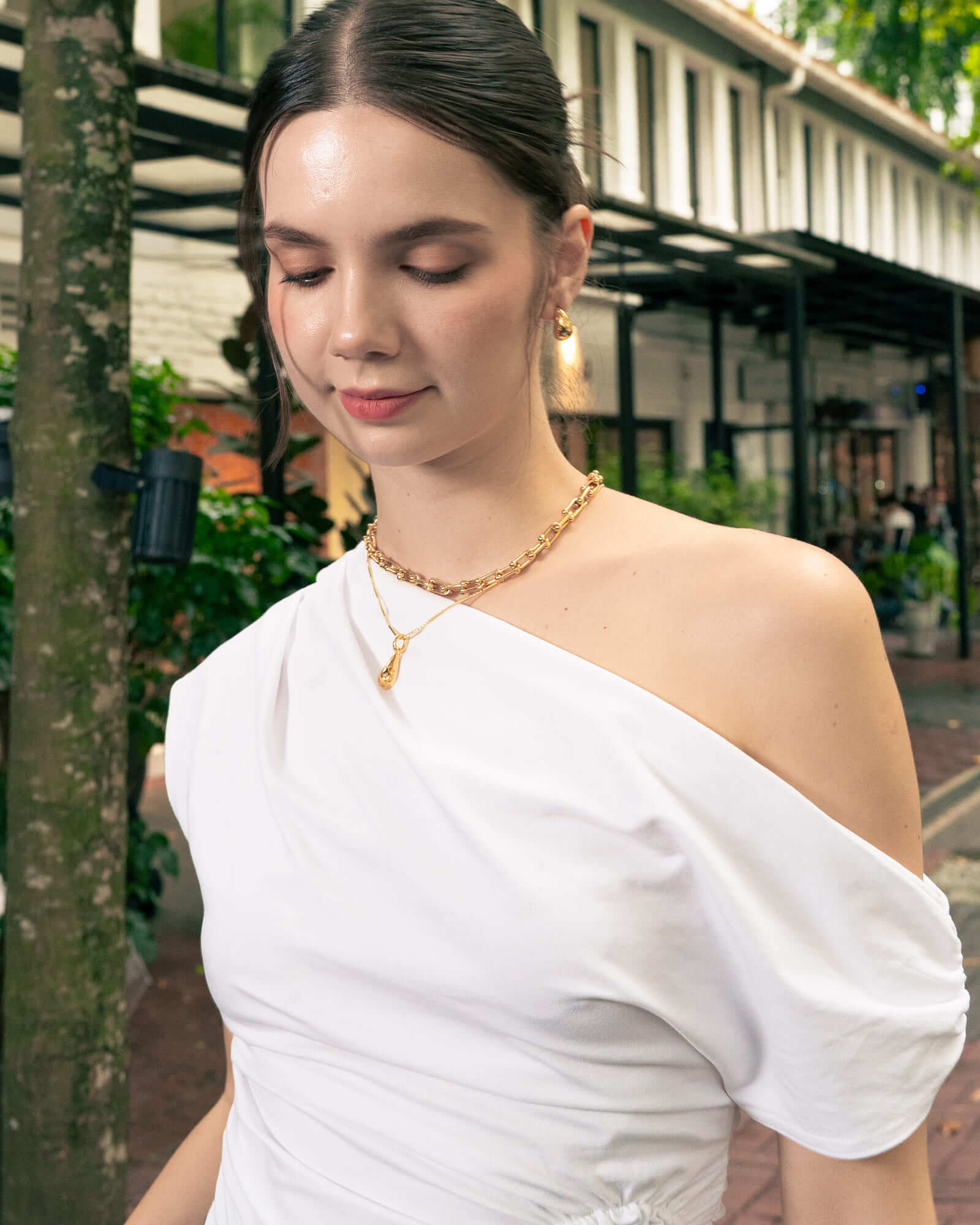 Stardust Raindrop Gold Pendant by Lavana, on model; with classic crescent moons and lab grown diamonds