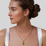 Stardust Raindrop Gold Pendant by Lavana on model with crescent moons and lab-grown diamonds