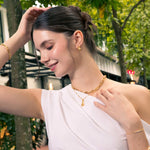 Stardust Raindrop gold classic earrings by LAVANA, on model; with lab grown diamonds