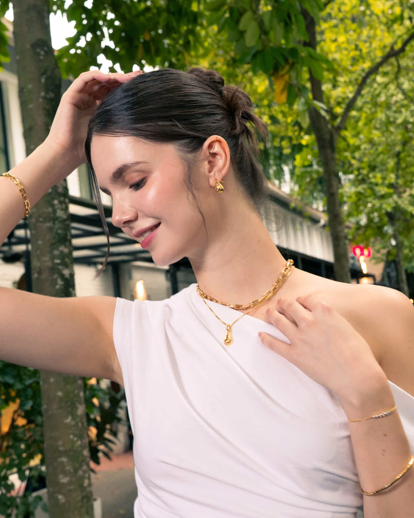 Stardust Raindrop gold classic earrings by LAVANA, on model; with lab grown diamonds