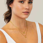 Sunshower Layered Gold Necklace by Lavana, on model; double layered chain with cloud charm and raindrop pendant