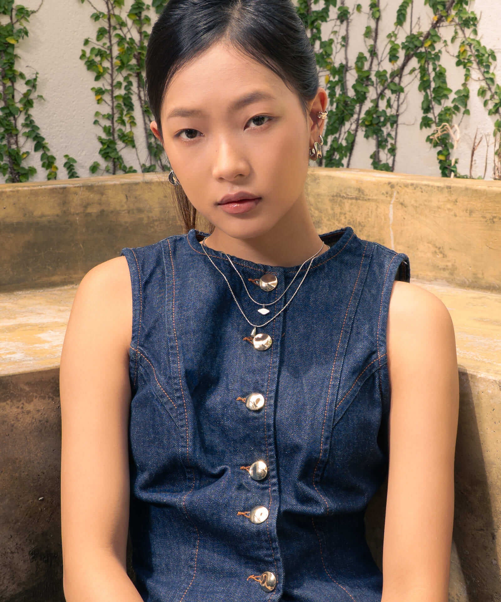 Sunshower Layered Silver Necklace by Lavana, on model; double layered chain with modern cloud charm and raindrop