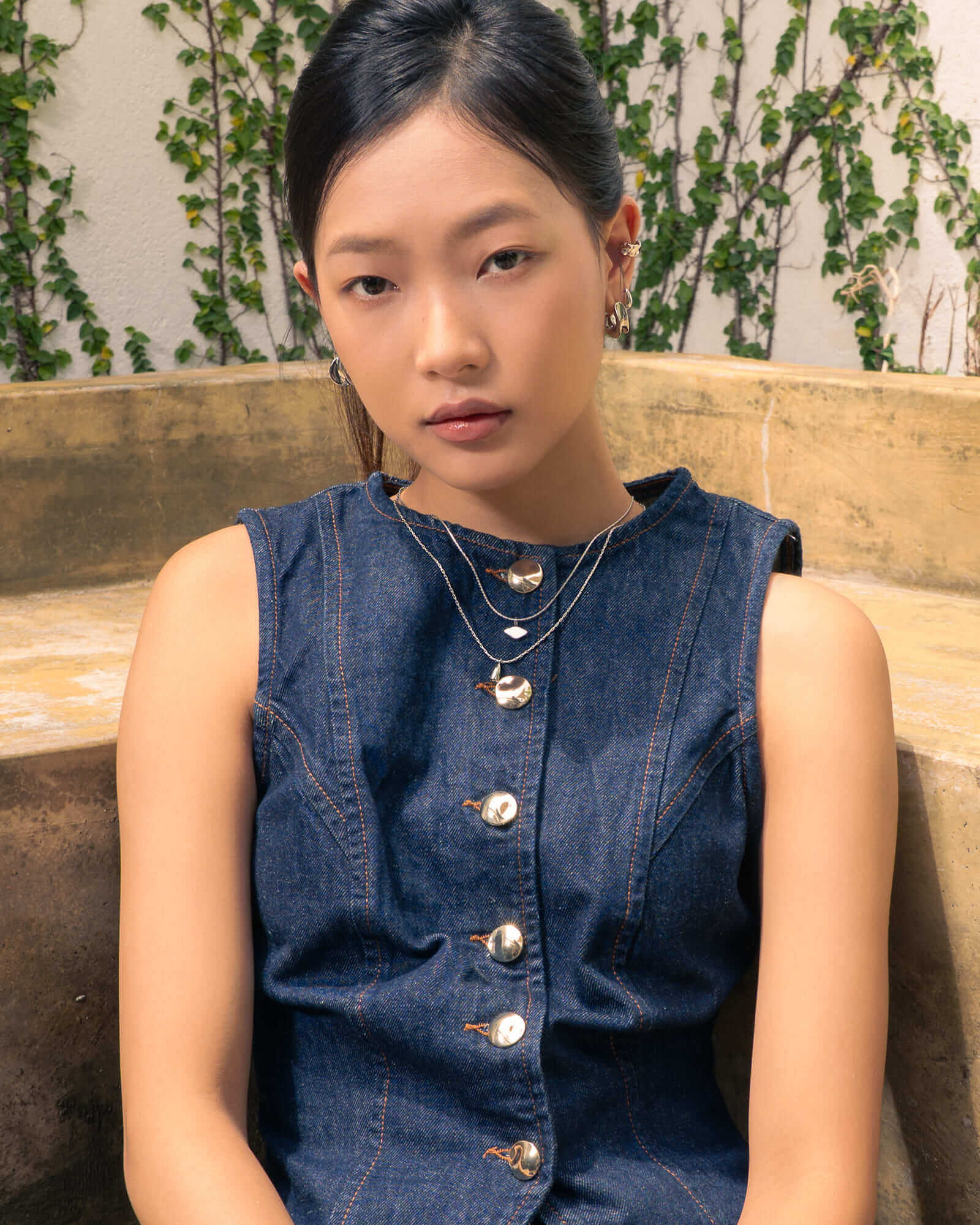 Sunshower Layered Silver Necklace by Lavana, on model; double layered chain with modern cloud charm and raindrop