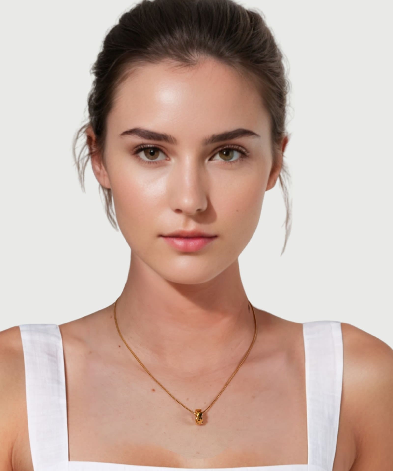 Sweetheart Gold Pendant by Lavana on model stacked heart motif charm