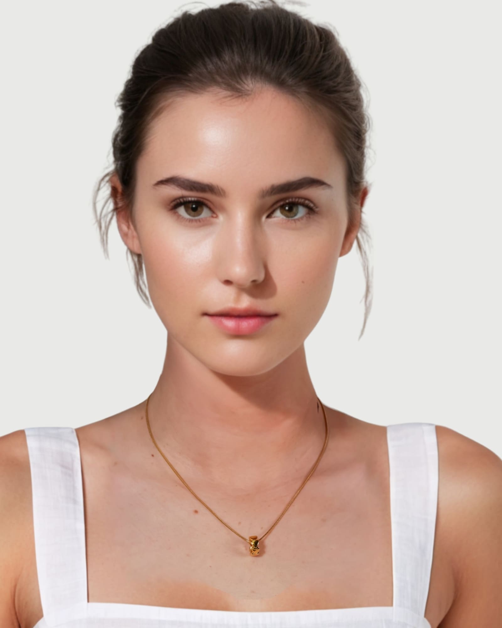 Sweetheart Gold Pendant by Lavana on model stacked heart motif charm