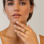 Swerve gold wrap ring by Lavana on model with polished by pass curve