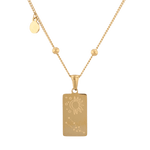 Taurus Gold Zodiac Tag Necklace by Lavana, engraved tag with constellation on beaded chain, back view