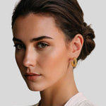 Tiny Pebbles Gold Hoop Earrings by Lavana on model double row of polished beads in an open hoop
