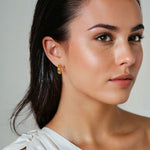 Tranquil Gold Hoop Earrings by Lavana on model layered front with inner patterned gallery