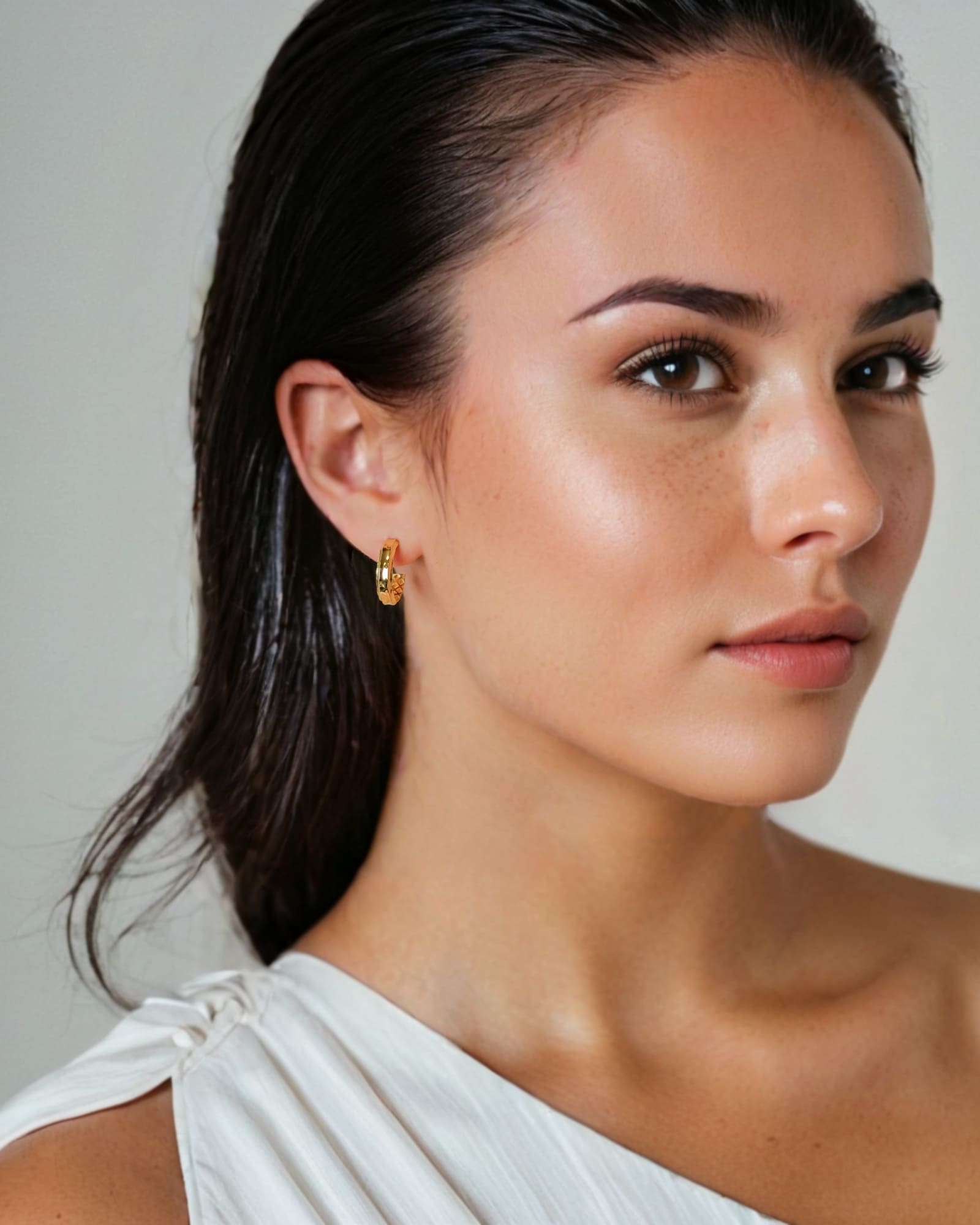 Tranquil Gold Hoop Earrings by Lavana on model layered front with inner patterned gallery