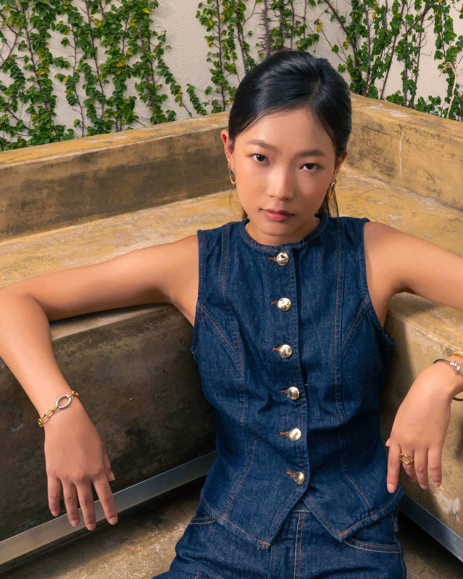 Treasure Two Tone Chain Bracelet by Lavana, on model with modern gold paperclip links silver rope oval and T-Bar 