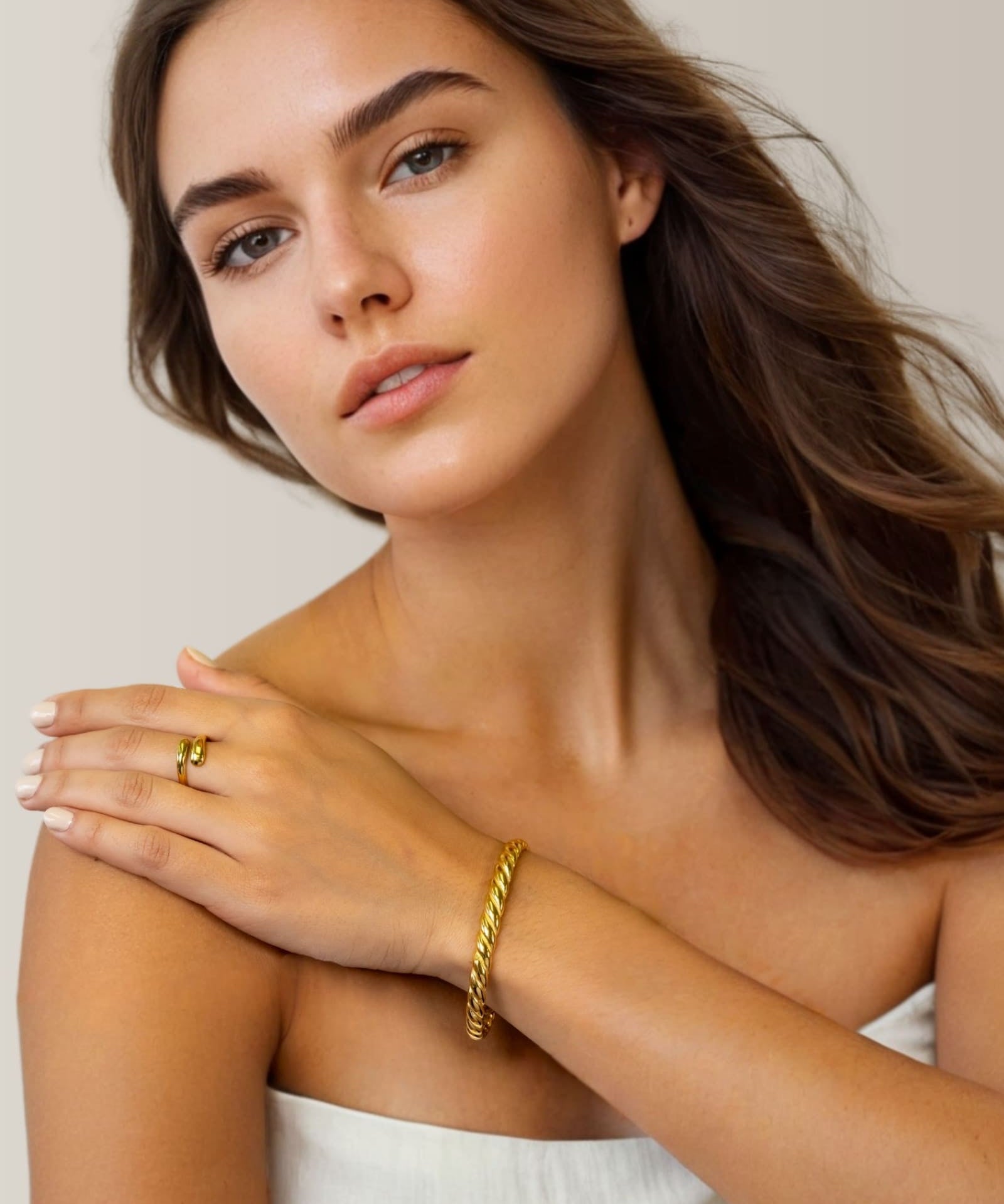 Twist Dome Gold Cuff Bracelet by Lavana on model with refined twisted dome texture