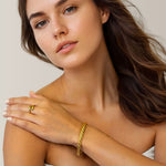 Twist Dome Gold Cuff Bracelet by Lavana on model with refined twisted dome texture