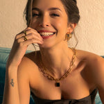 Twist Textured Gold Hoop Earrings by LAVANA, on model; large sculptural twisted dress hoops