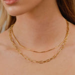 Verona Gold Paperclip Chain Necklace by Lavana on model with elongated polished links
