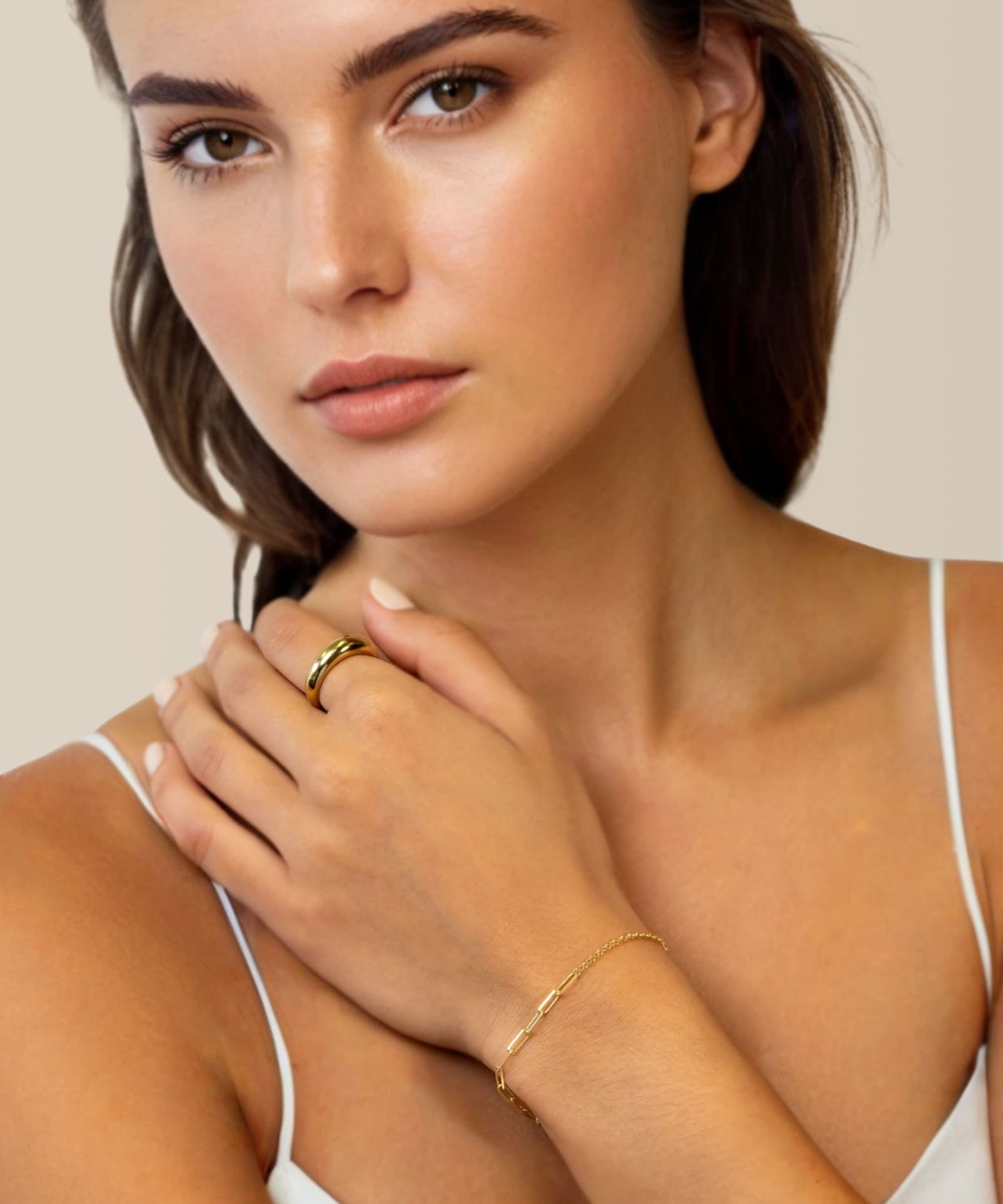 Verona gold mixed link bracelet by Lavana on model with paperclip and Belcher links