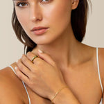 Verona gold mixed link bracelet by Lavana on model with paperclip and Belcher links