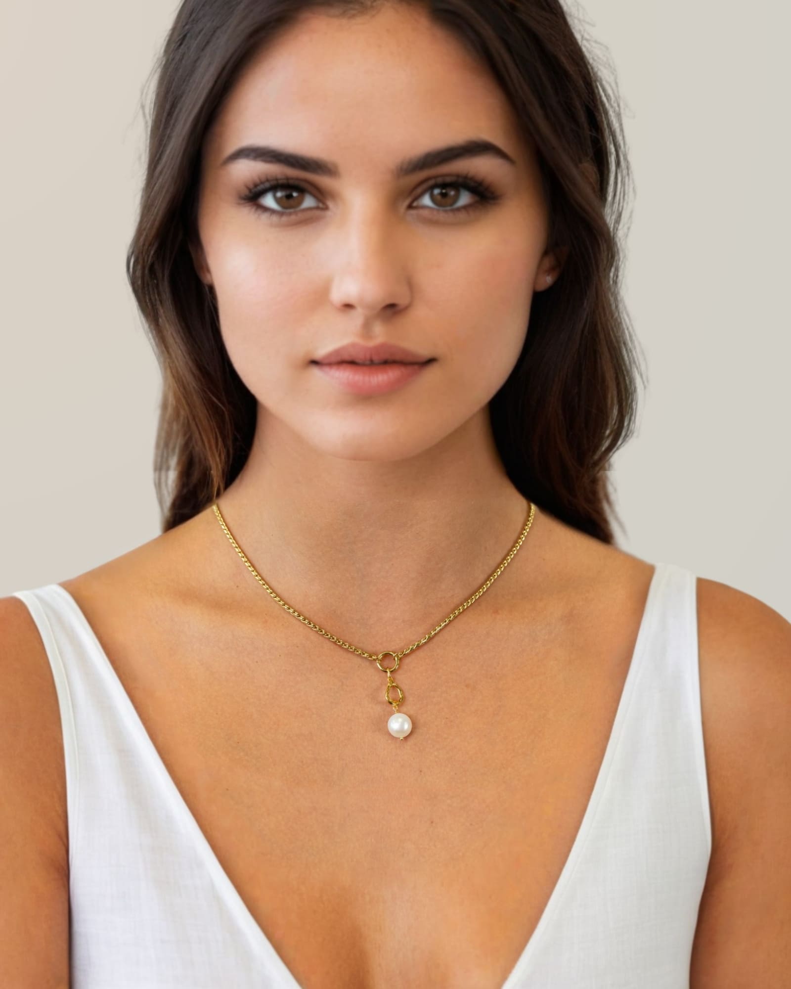 Vista Charm Gold Chain Necklace by Lavana, on model; with front charm ring Mondello Pearl Pendant with sculptural teardrop 
