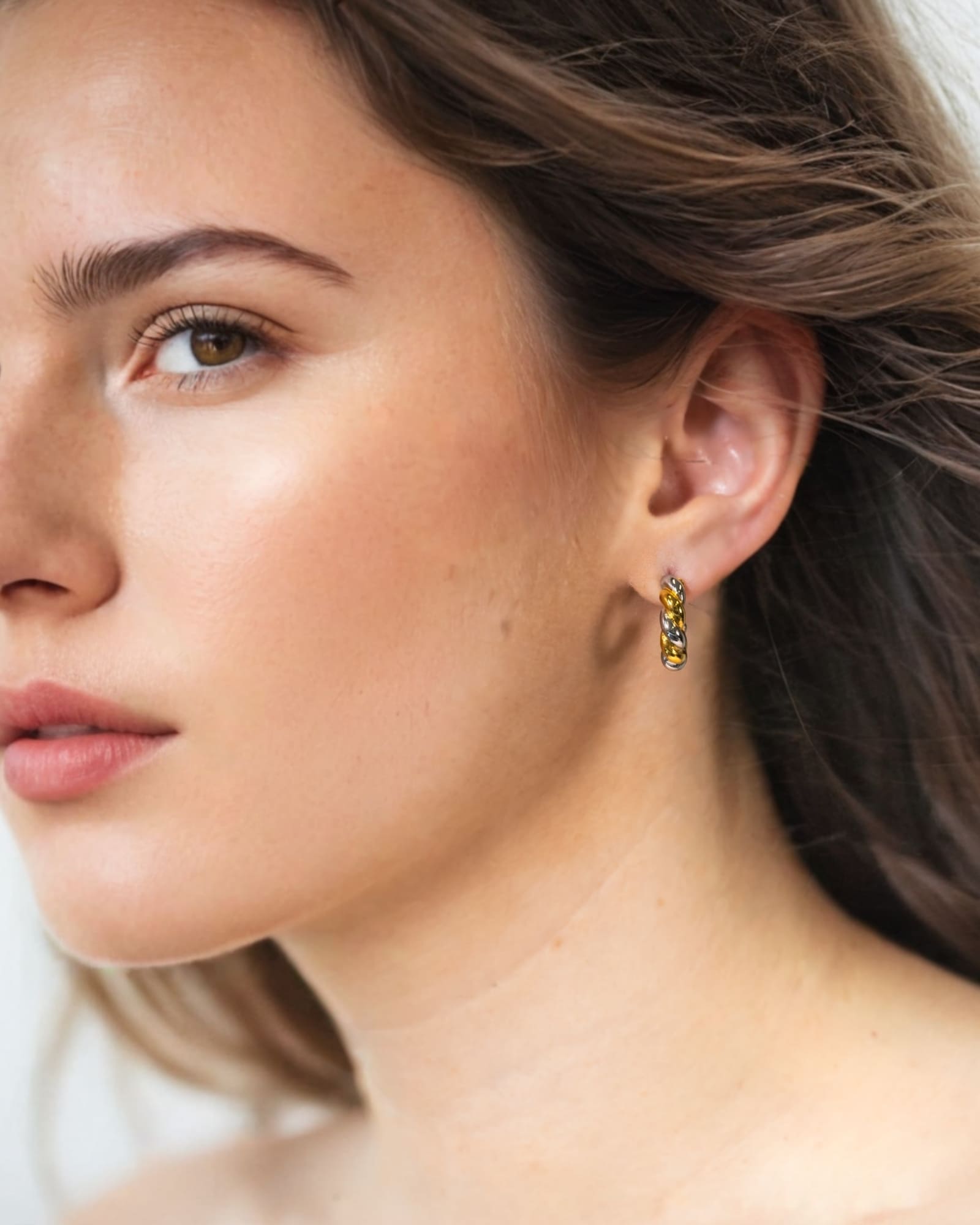 Woven Two Tone Half Hoop Earrings by Lavana on model in mixed metal rope design