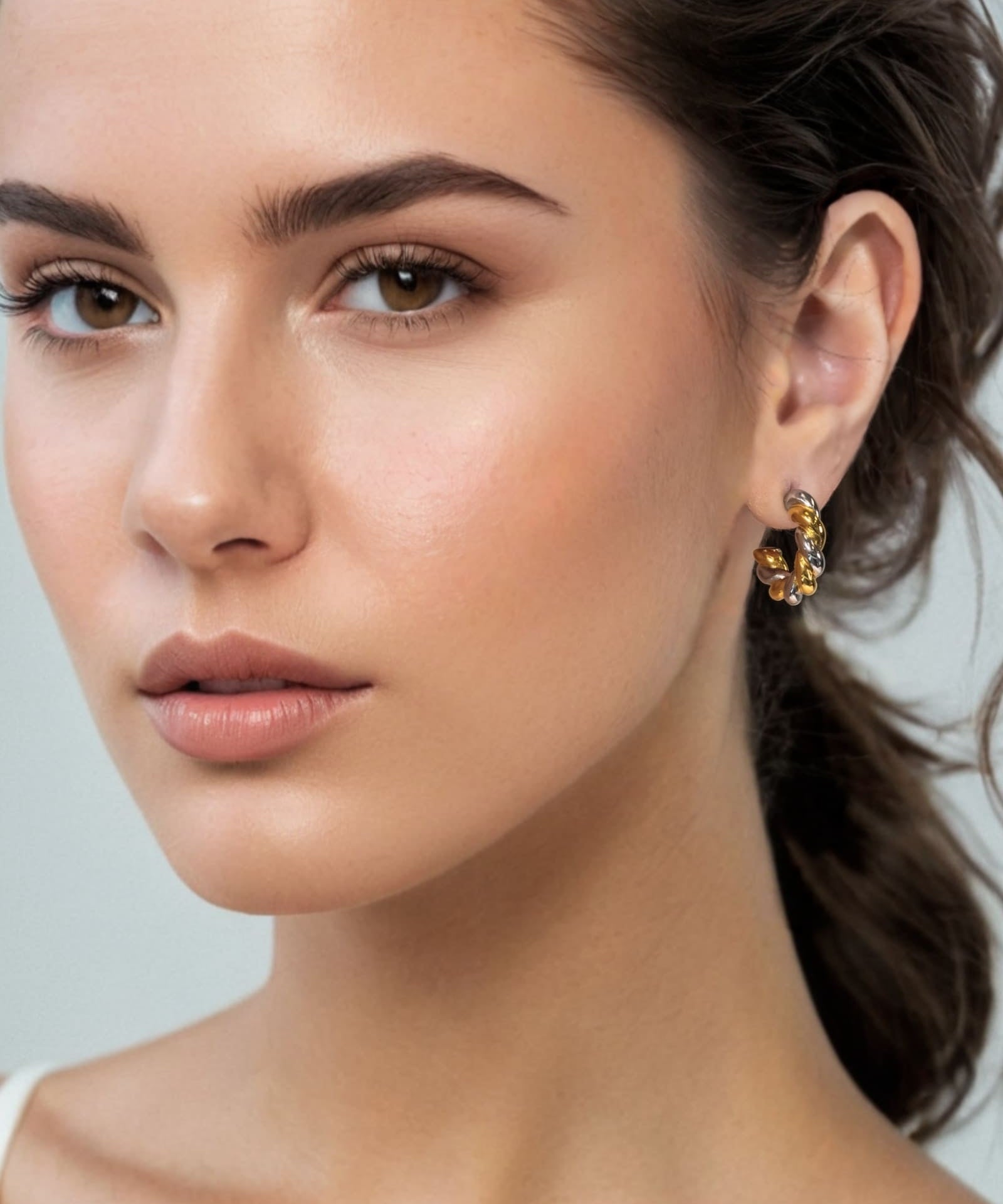 Woven Two Tone Half Hoop Earrings by Lavana on model in mixed metal rope design