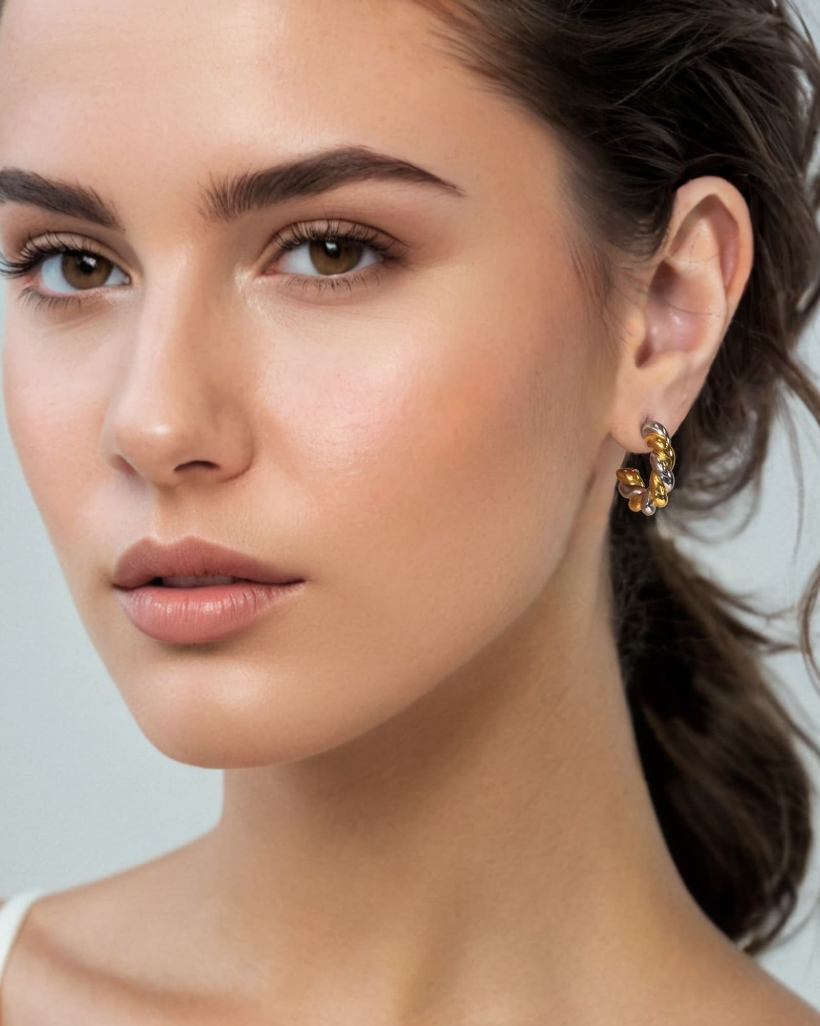 Woven Two Tone Half Hoop Earrings by Lavana on model in mixed metal rope design