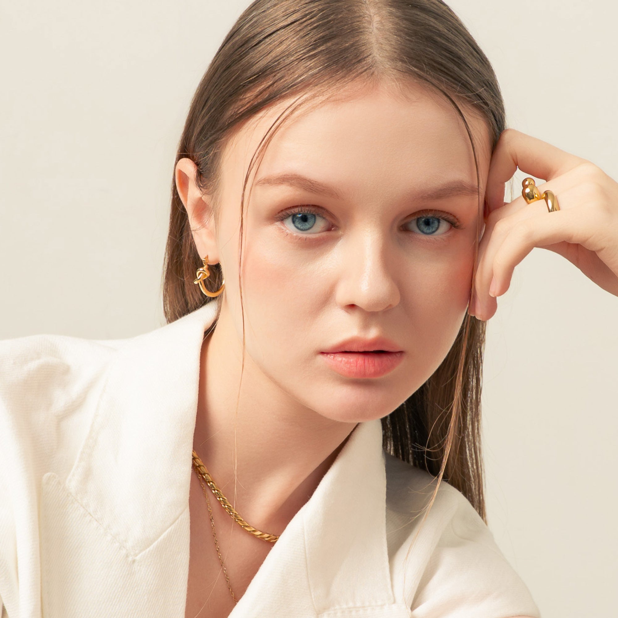LAVANA jewellery banner featuring evolving gold necklace and ring in lifestyle setting on Homepage